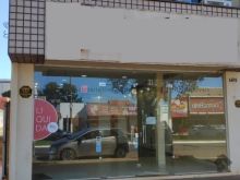 Salão central - blindex frontal do prédio